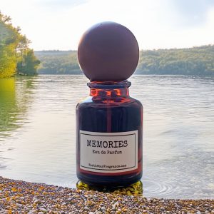 Memories Eau de Parfum by NorthStarFragrance.com on a pebbled lake shore